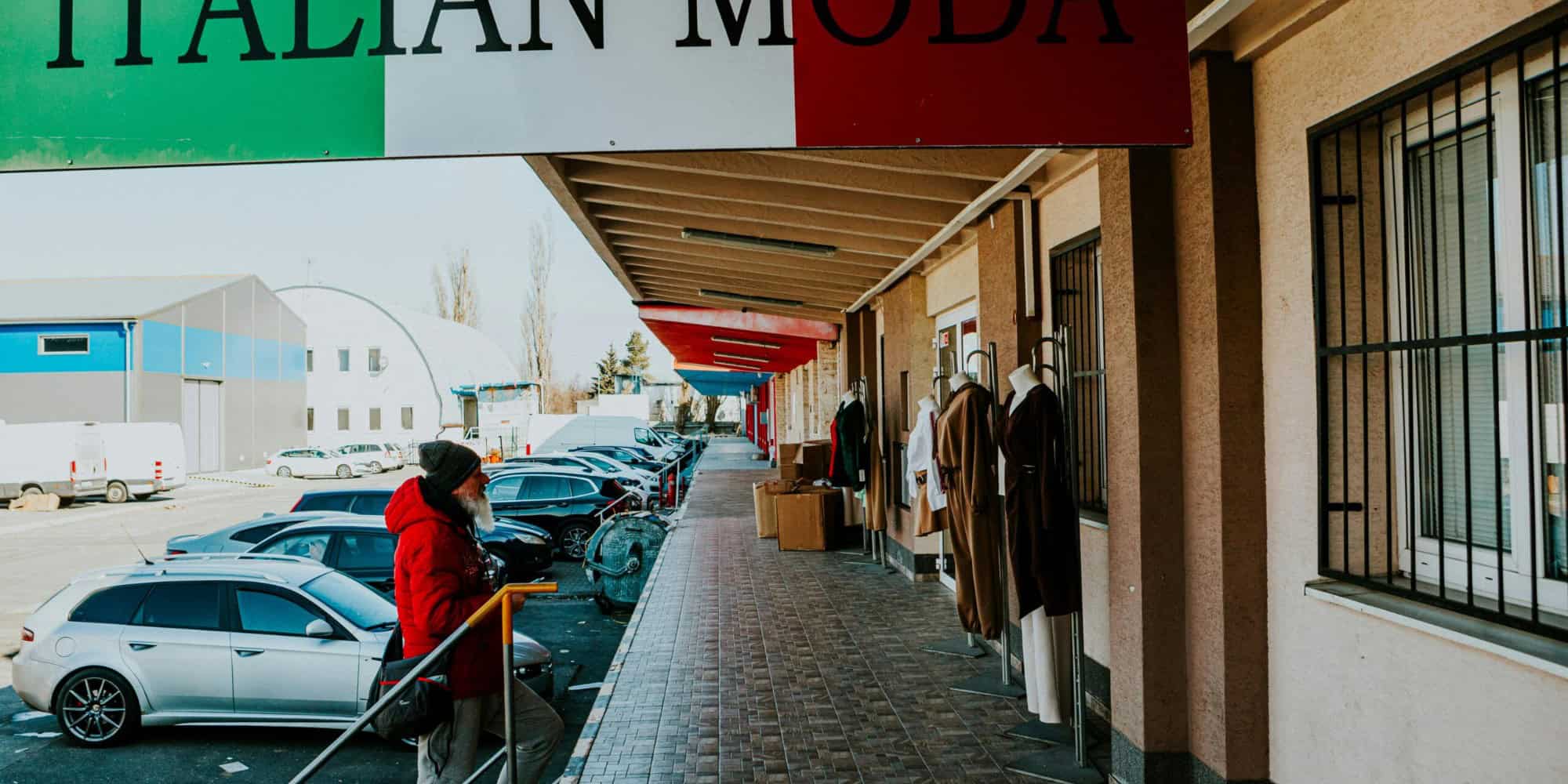 Italian fashion market with storefronts and shopping