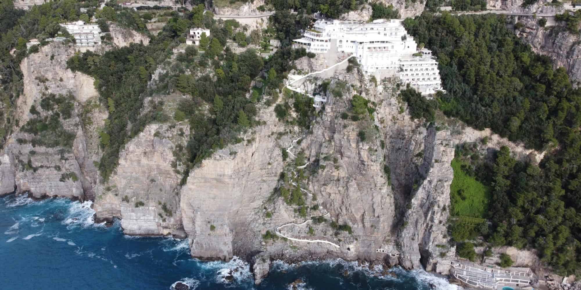 Stunning aerial view of the Amalfi Coast with white buildings on cliffs